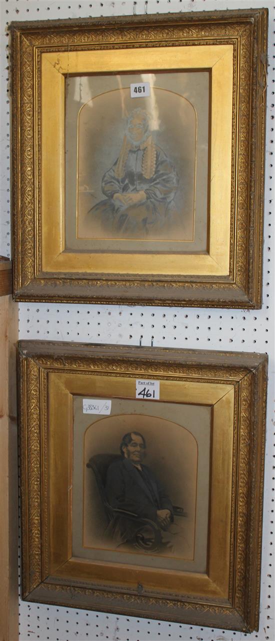 2 framed photographs of a man & woman